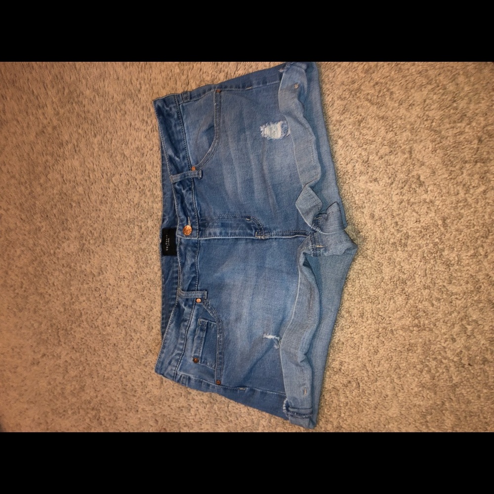 Blue distressed shorts